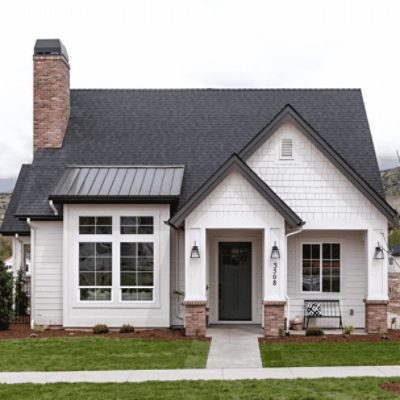 A modern home with an exterior painted in shoji white sw 7042 by @laurensmythdesign.