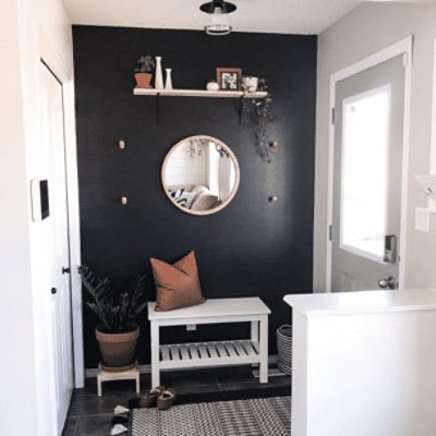 Entryway painted in Black Magic SW 6991 by @stacykarjala.