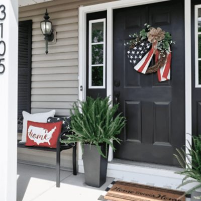 Front door painted in Black Magic SW 6991 by @styledwith_sarah.