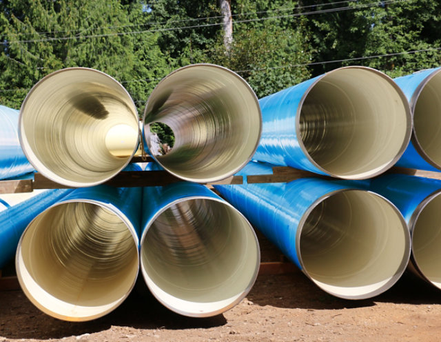 Transmission pipes coated with blue exterior and cream interior 