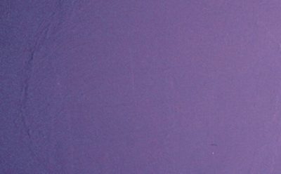 A sheet of dark purple paint with marring paint.