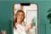 An iphone promoting a virtual color consultation with a person holding up some color cards.