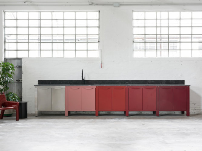 kitchen cabinetry in various shades of Sherin-Williams red coating