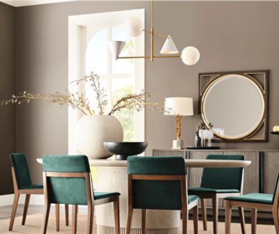 A dining room painted Warm Stone SW7032 with trim painted Oyster White SW7637.