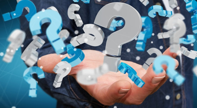 Hand with question marks