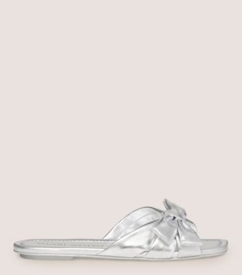 Stuart Weitzman Sofia Bow-detailed Metallic Leather Slides In Silver